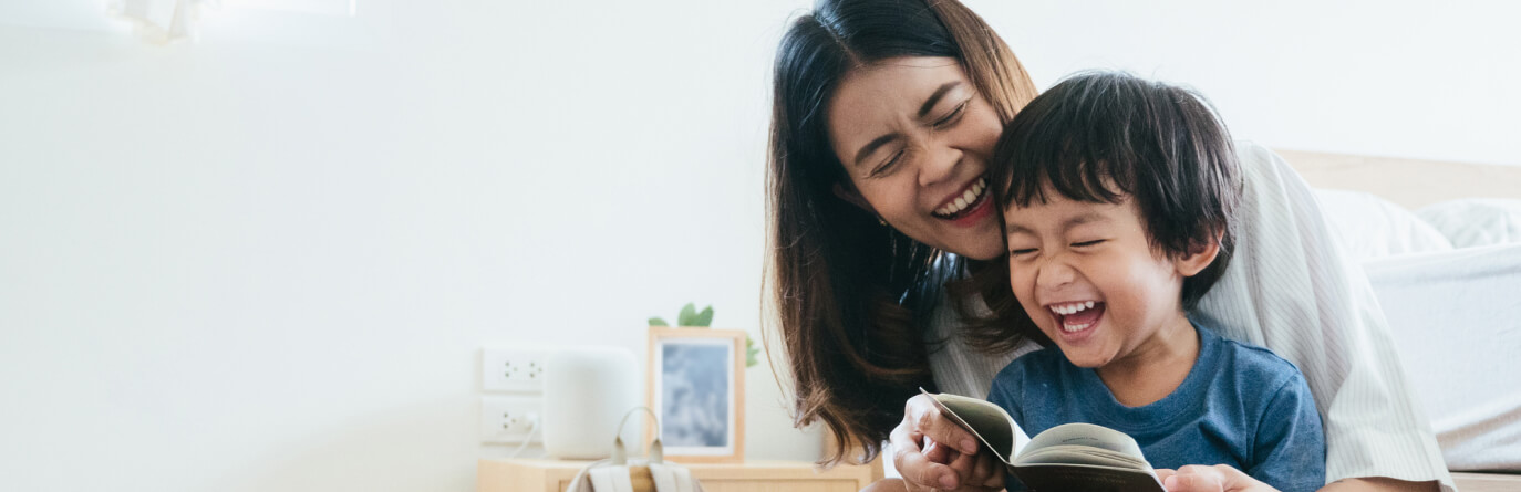 Mother and son laughing