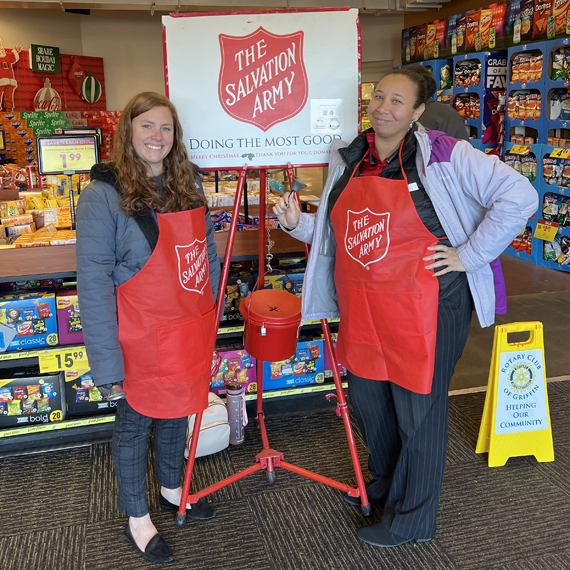 Salvation Army employees standing together in a store.