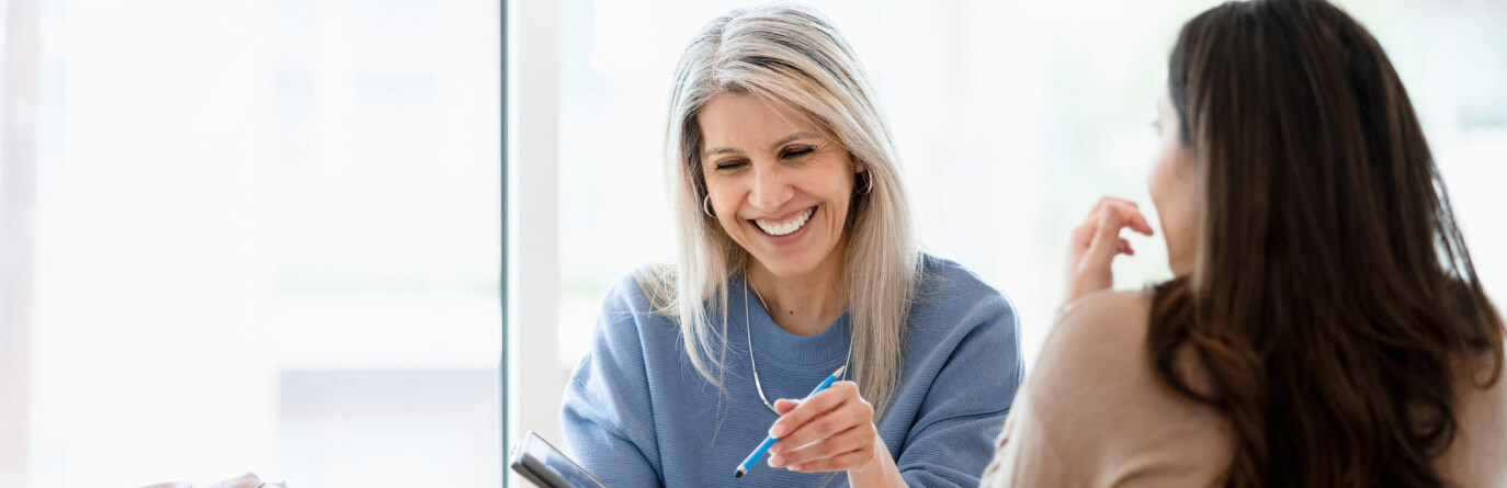 Two women in a meeting
